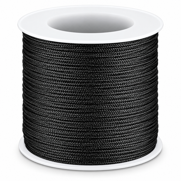 A spool of black braided cord or rope, wound tightly around a white plastic core, shown on a clean white background.