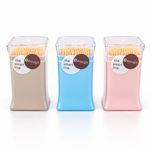 Three square-shaped cotton swab containers in beige, light blue, and light pink, arranged side by side on a white background. Each container has a clear lid, filled with light yellow cotton swabs, and features a brown and white circular label that reads 'the enough smart line.