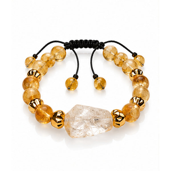 7agat citrine beaded bracelet with clear quartz centerpiece and gold-tone hematite spacers.