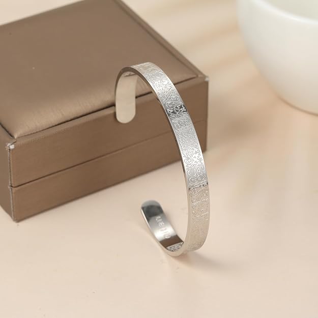 Unisex Ayatul Kursi Islamic cuff bracelet with Arabic engraving in gold, silver, and black finishes, made of metal jewelry.