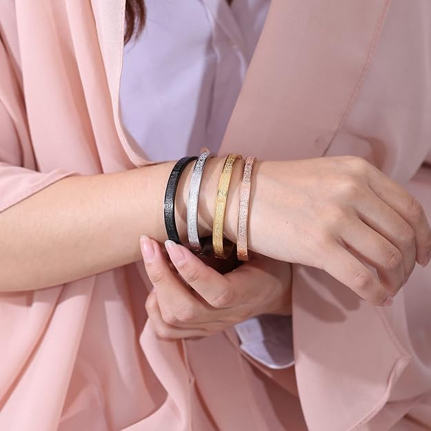 Unisex Ayatul Kursi Islamic cuff bracelet with Arabic engraving in gold, silver, and black finish, metal faith jewelry.