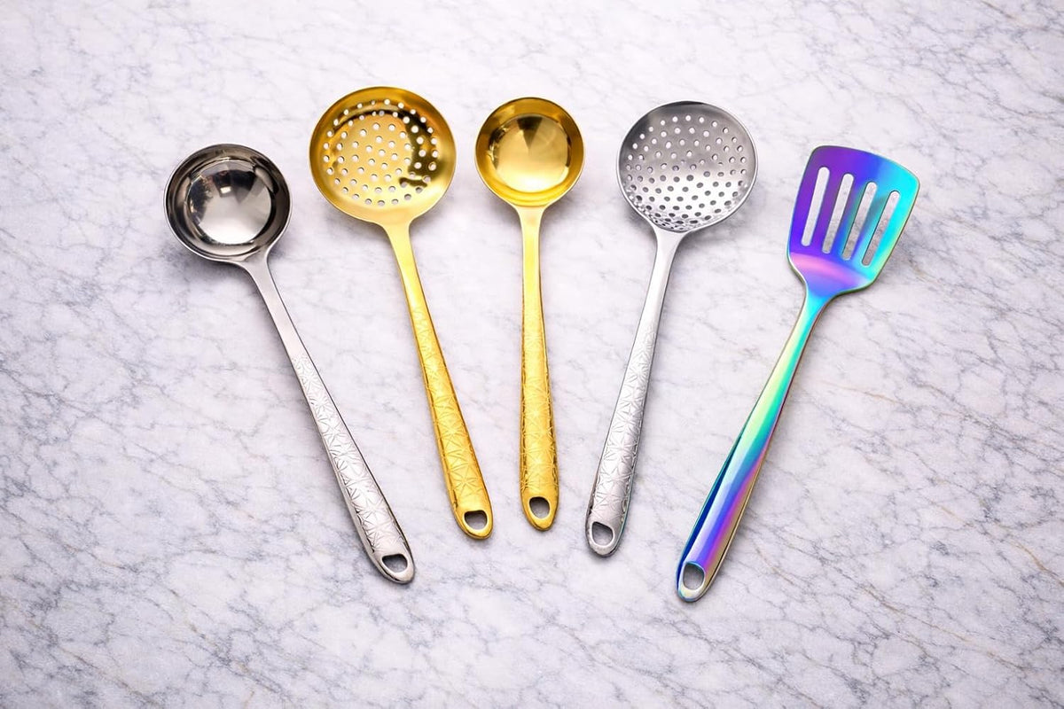 7AGAT stainless steel kitchen utensil with ergonomic handle, heat and rust-resistant, dishwasher safe in silver, gold, and rainbow finishes.
