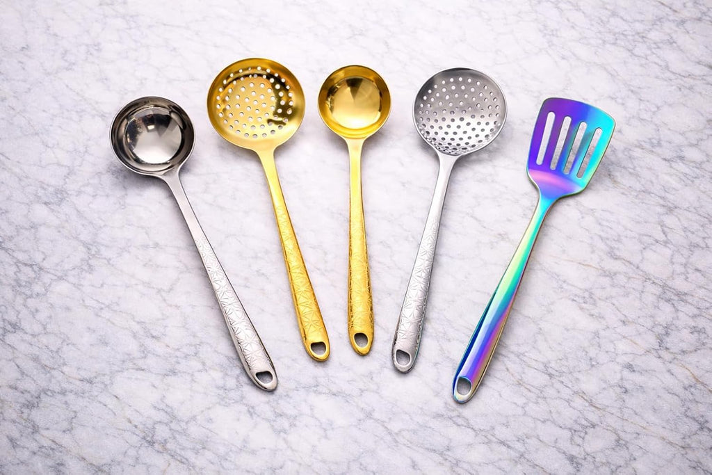 7AGAT stainless steel kitchen utensil with ergonomic handle, heat and rust-resistant, dishwasher safe in silver, gold, or rainbow finish.