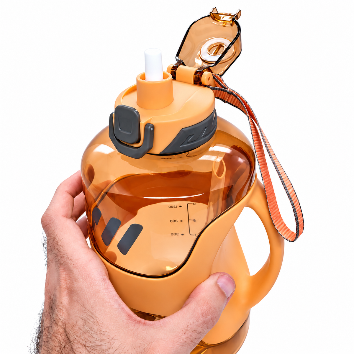 Close-up of a hand holding the amber-orange 7AGAT 2.2L sports water bottle, showing its open flip-top lid, drinking straw, side handle, and wrist strap.