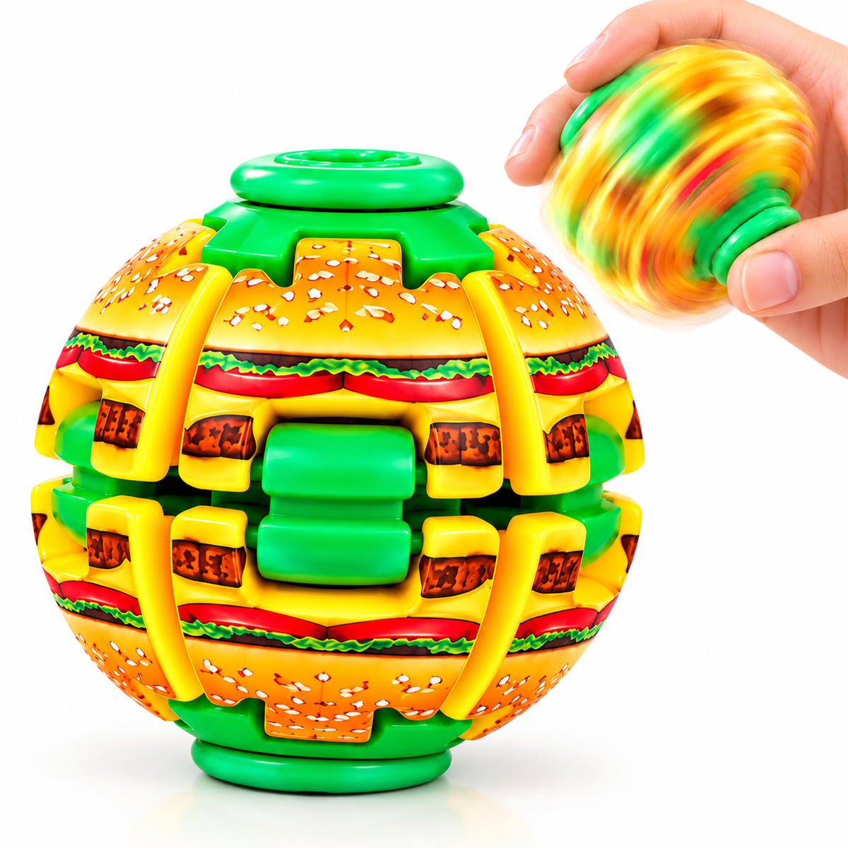 A colorful plastic toy puzzle ball shaped like a hamburger, shown with a hand spinning a matching green and yellow ball on a white background.