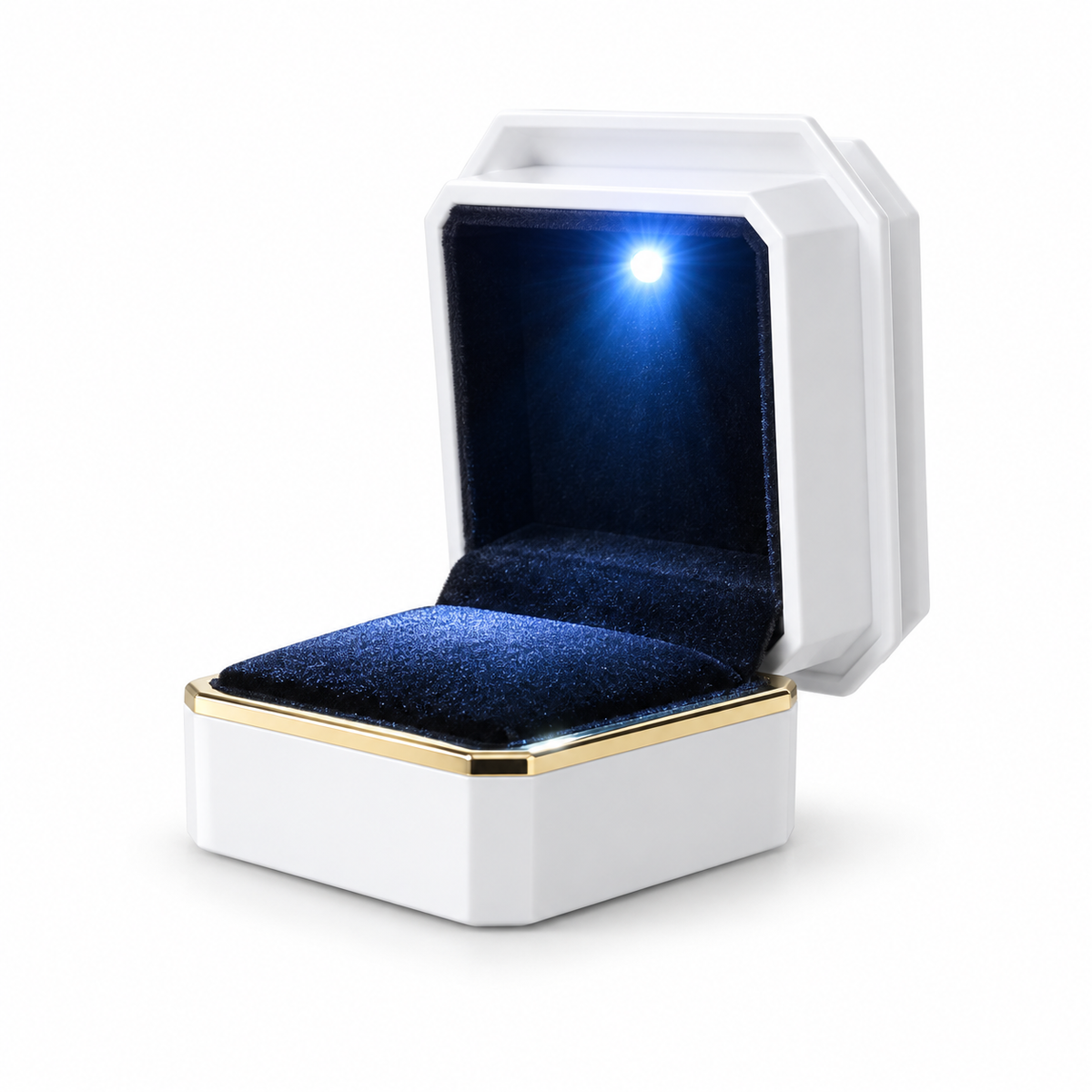 A white octagonal ring box with an open lid, featuring a blue velvet interior and a built-in LED light glowing from the top of the lid. The box has a gold trim accent and is set against a clean white background.