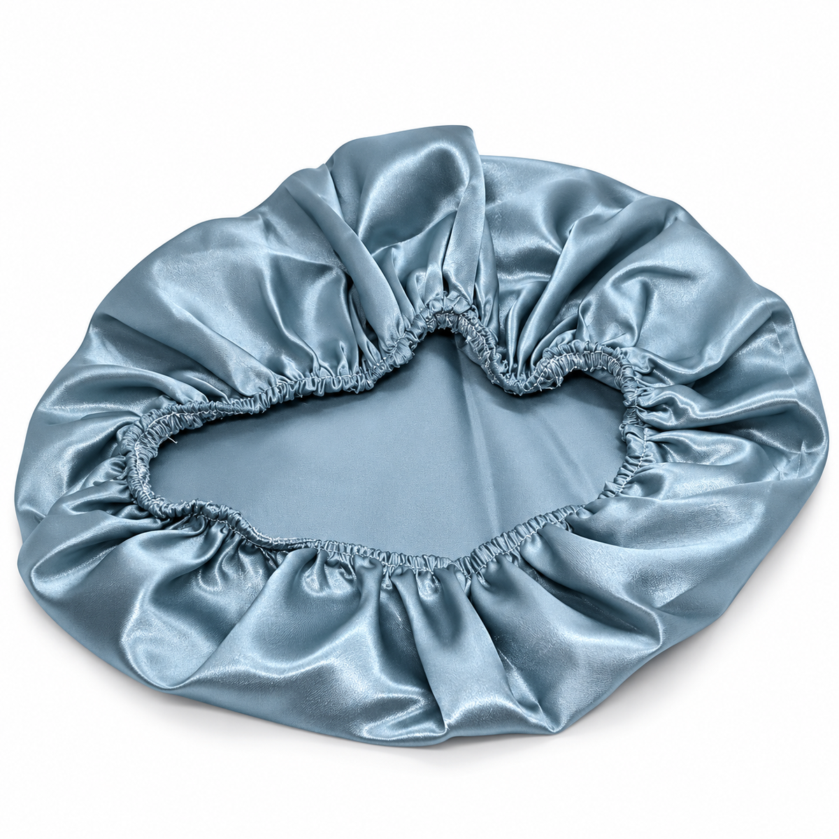A light blue satin bonnet with an elasticized gathered edge, shown on a plain white background.