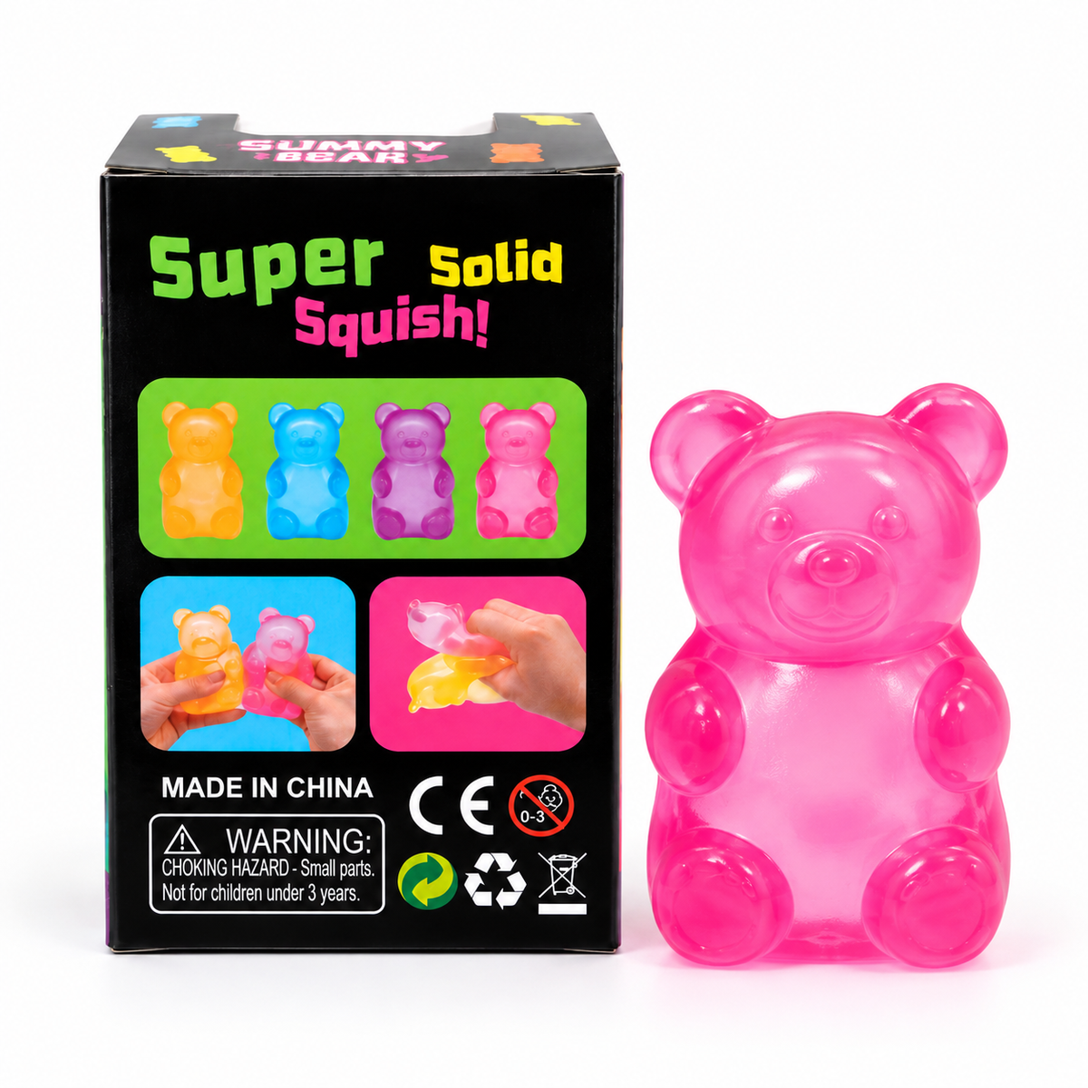 A pink translucent gummy bear toy standing next to its black retail box on a white background. The box features colorful graphics of gummy bears, demonstration photos of hands squishing the toy, and text reading 'Super Solid Squish!'.