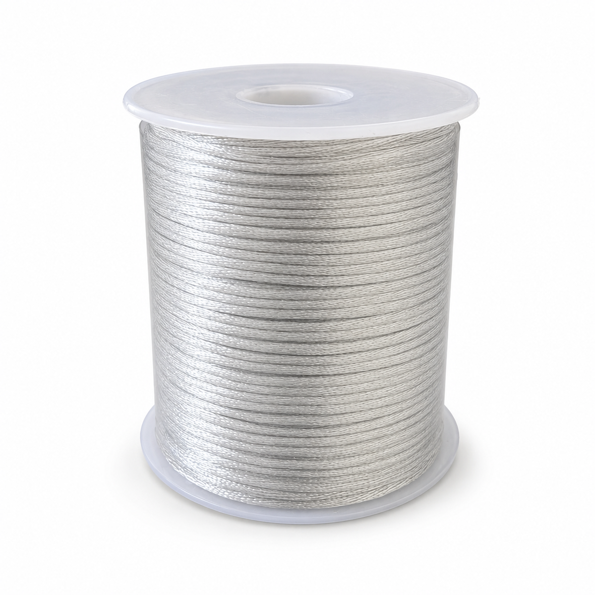 A spool of silver-colored braided cord or wire, wound tightly on a translucent plastic core, shown against a plain white background.