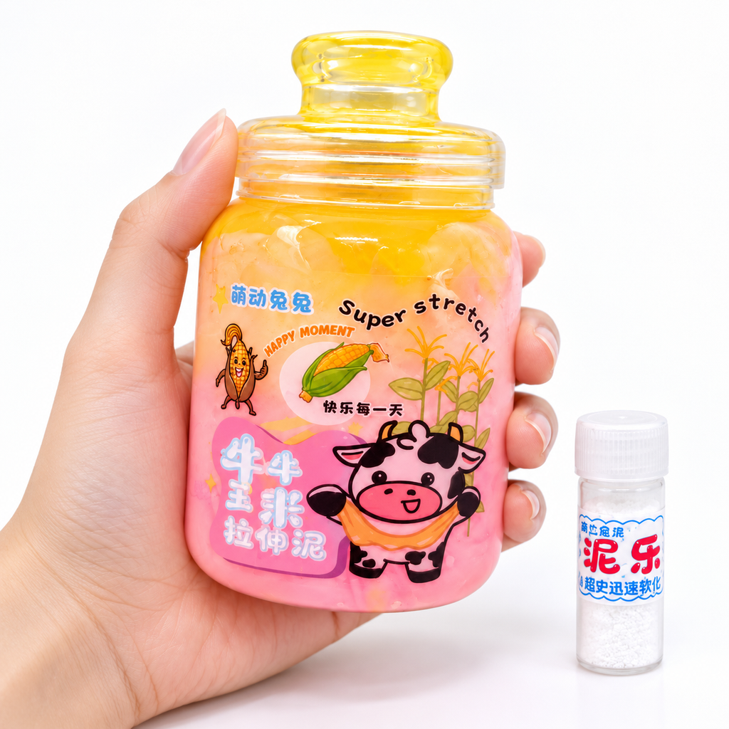 A hand holds a clear plastic bottle filled with yellow stretchy slime, labeled in Chinese with cartoon graphics and the words 'Super stretch.' A small white bottle of white powder sits to the right on a clean white background.