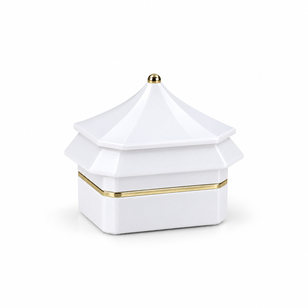 A white ceramic jewelry box with a tiered pagoda-style lid and gold trim details, shown on a clean white background.