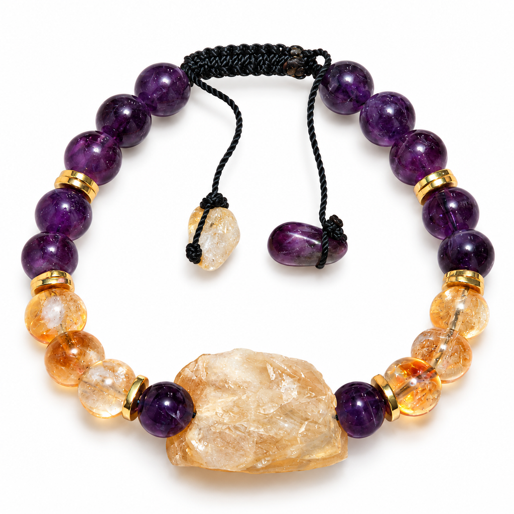 7agat amethyst and citrine beaded bracelet with raw citrine centerpiece and gold-tone hematite spacers on white background.