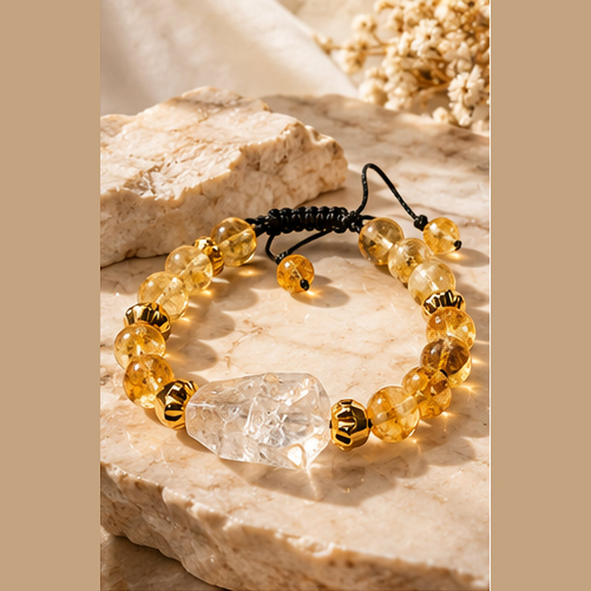 7agat honey-yellow citrine bracelet with a clear quartz centerpiece.