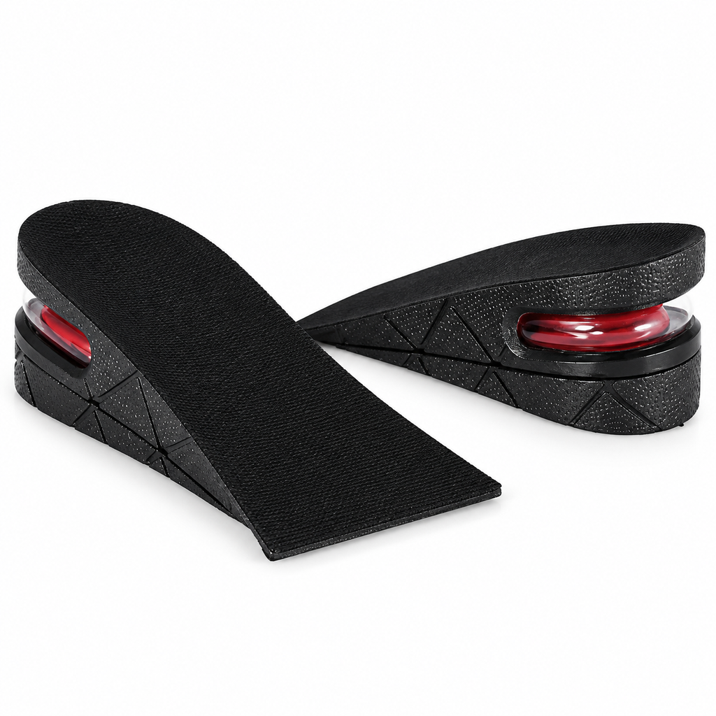 A pair of black wedge shoe inserts with textured geometric patterns and red cushioned air-like accents, displayed on a clean white background.