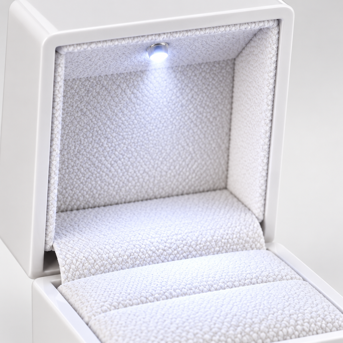Luxury arc-shaped LED ring box by 7AGAT, perfect for proposals and engagements, with built-in lighting for jewelry presentation.