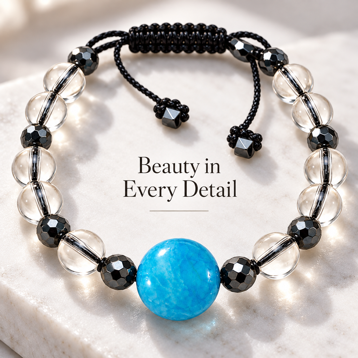7agat macro detail of Light Blue Agate centerpiece transparent glass beads and smoky Hematite spacers.