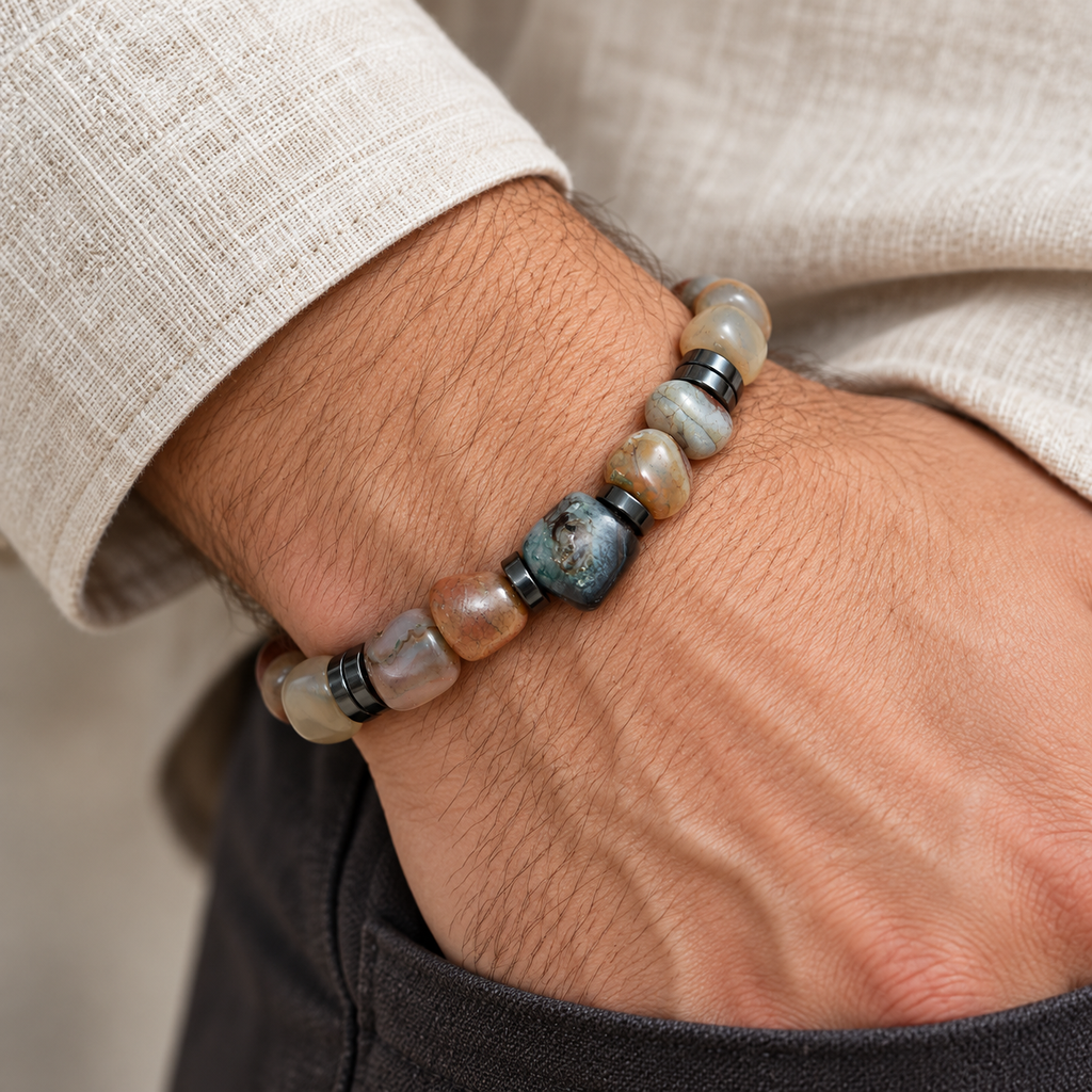 7agat Mixed Color Agate bracelet with Hexagonal Agate and Fumé Hematite worn on a man's wrist.