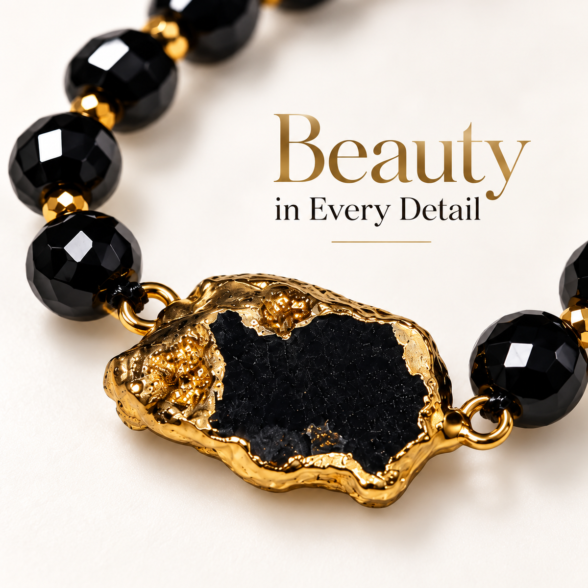 7agat close up of black quartz agate centerpiece with gold hematite details.