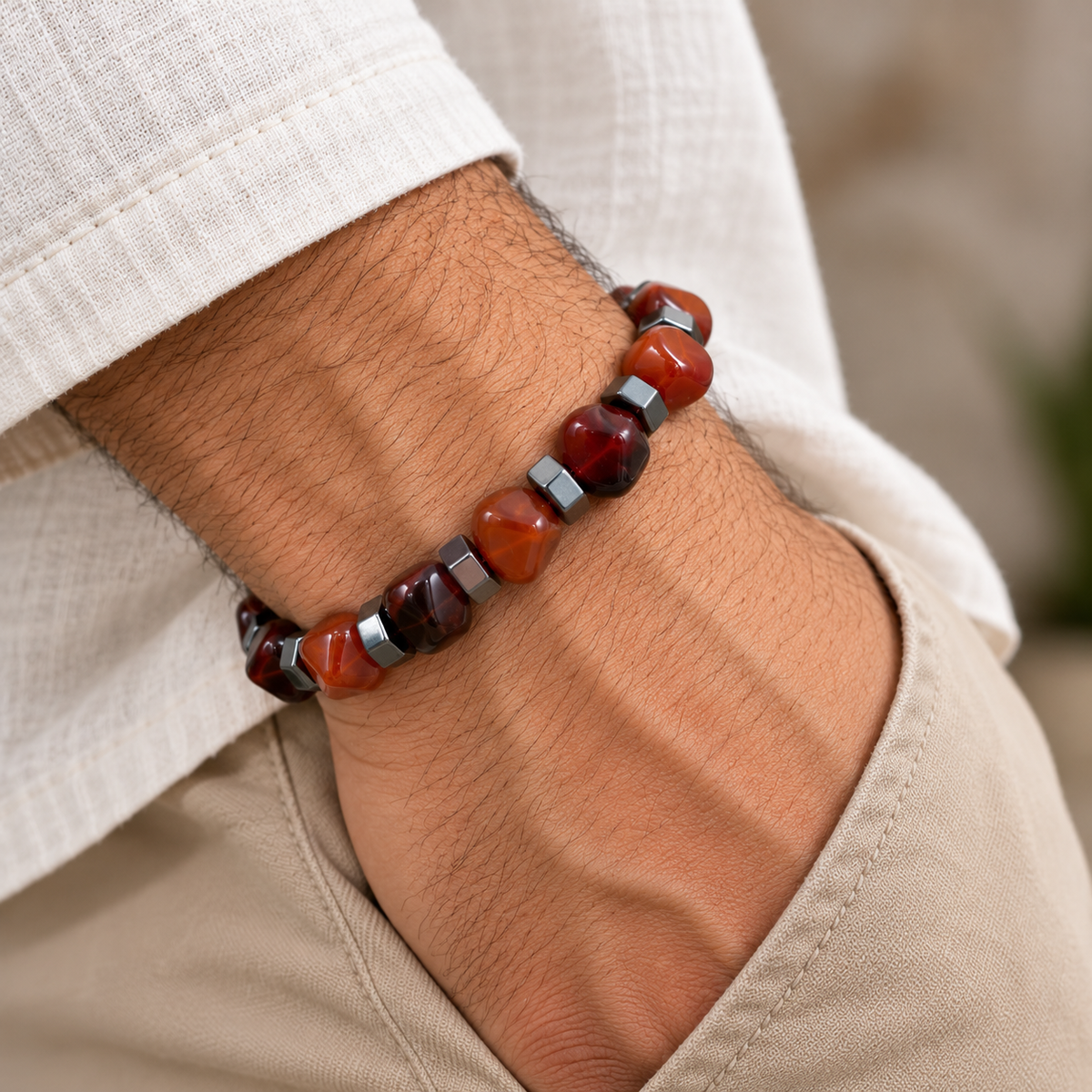 7agat Reddish Brown Agate and Silver Hematite bracelet worn on a man's wrist.