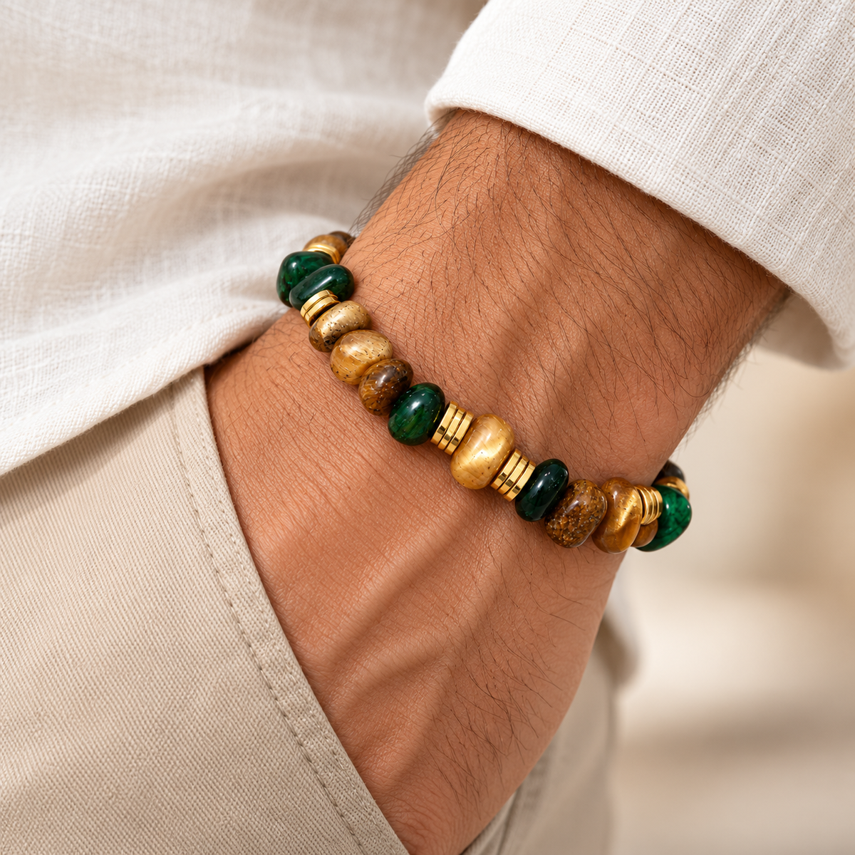 7agat illustrative men's wrist styling of a green and camel Tiger Eye beaded bracelet